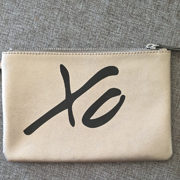Banana Republic Handbags - Banana Republic Clutch With XO Design